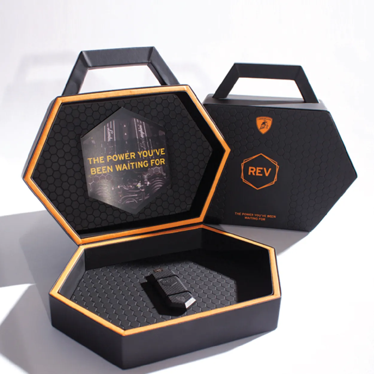 An image showing a luxury, hexagon shaped custom box branded by Lambo