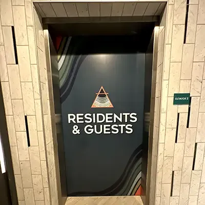 elevator signs at AlphaGraphics San Marcos