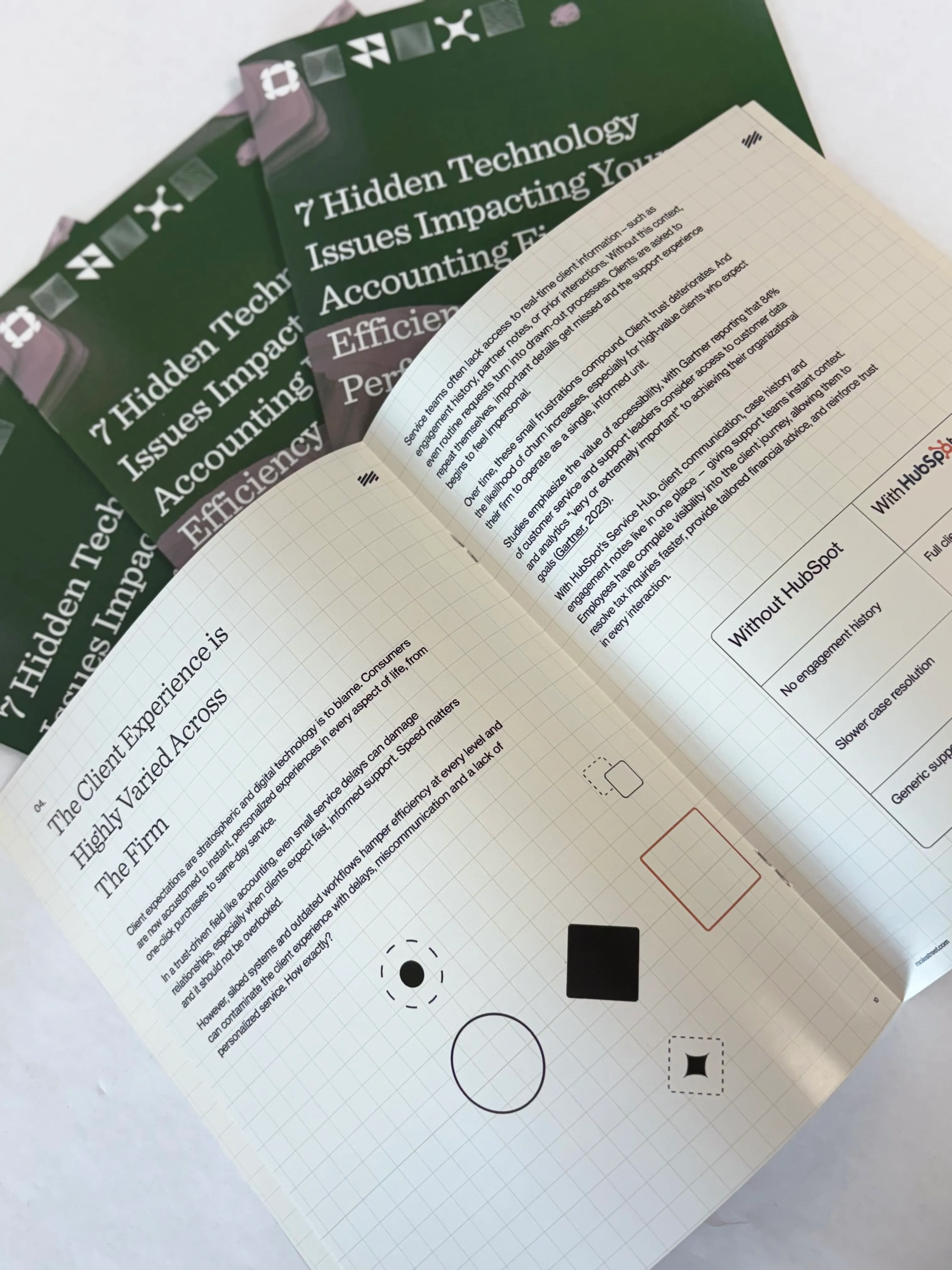 A close-up of an open booklet with grid-style layout and stylized icons, showing professional text content designed for accounting firms.